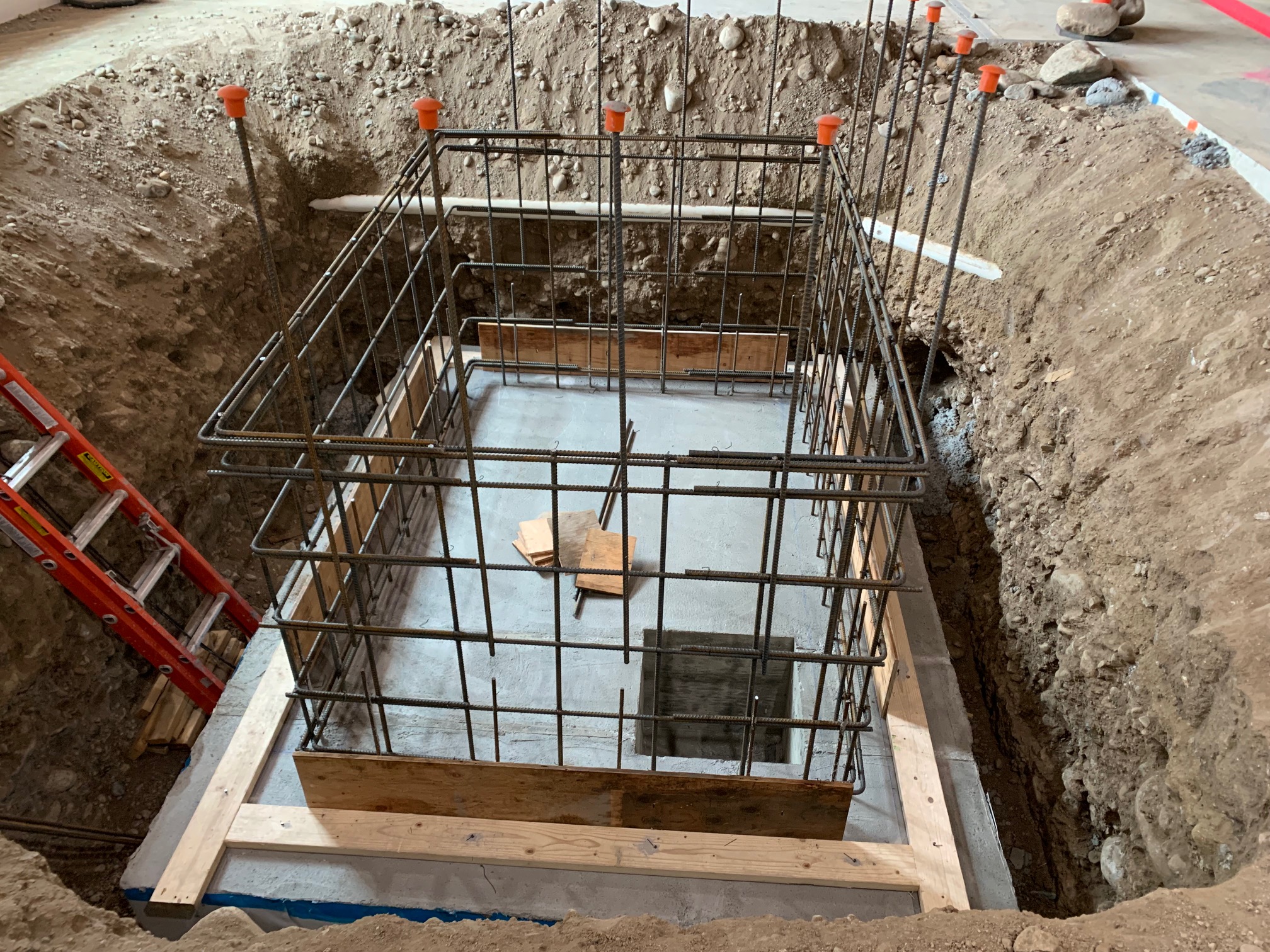Rebar is placed for the elevator pit walls.
