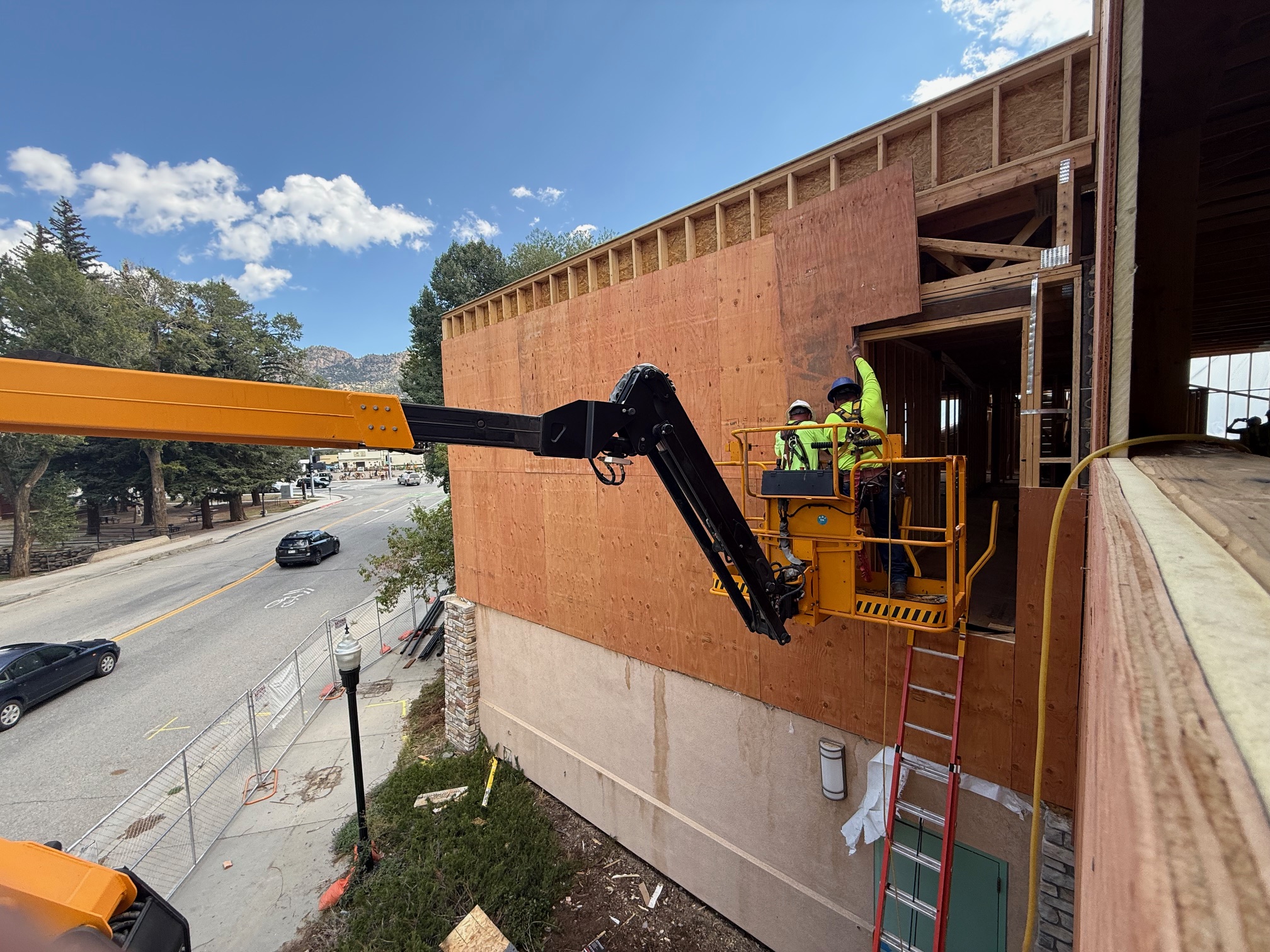 Installation of exterior sheathing.